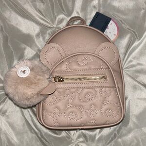 Under One Sky Beige Backpack with Pom Pom